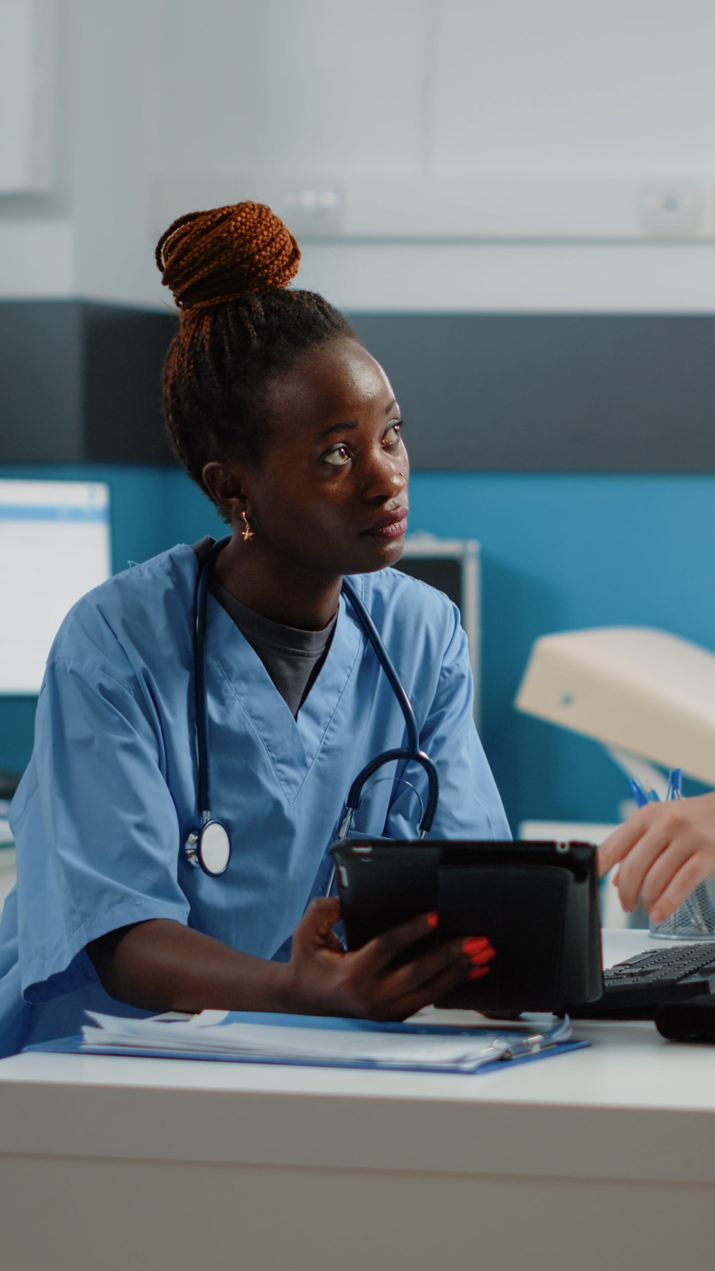 medical team of nurses using tablet with touch screen