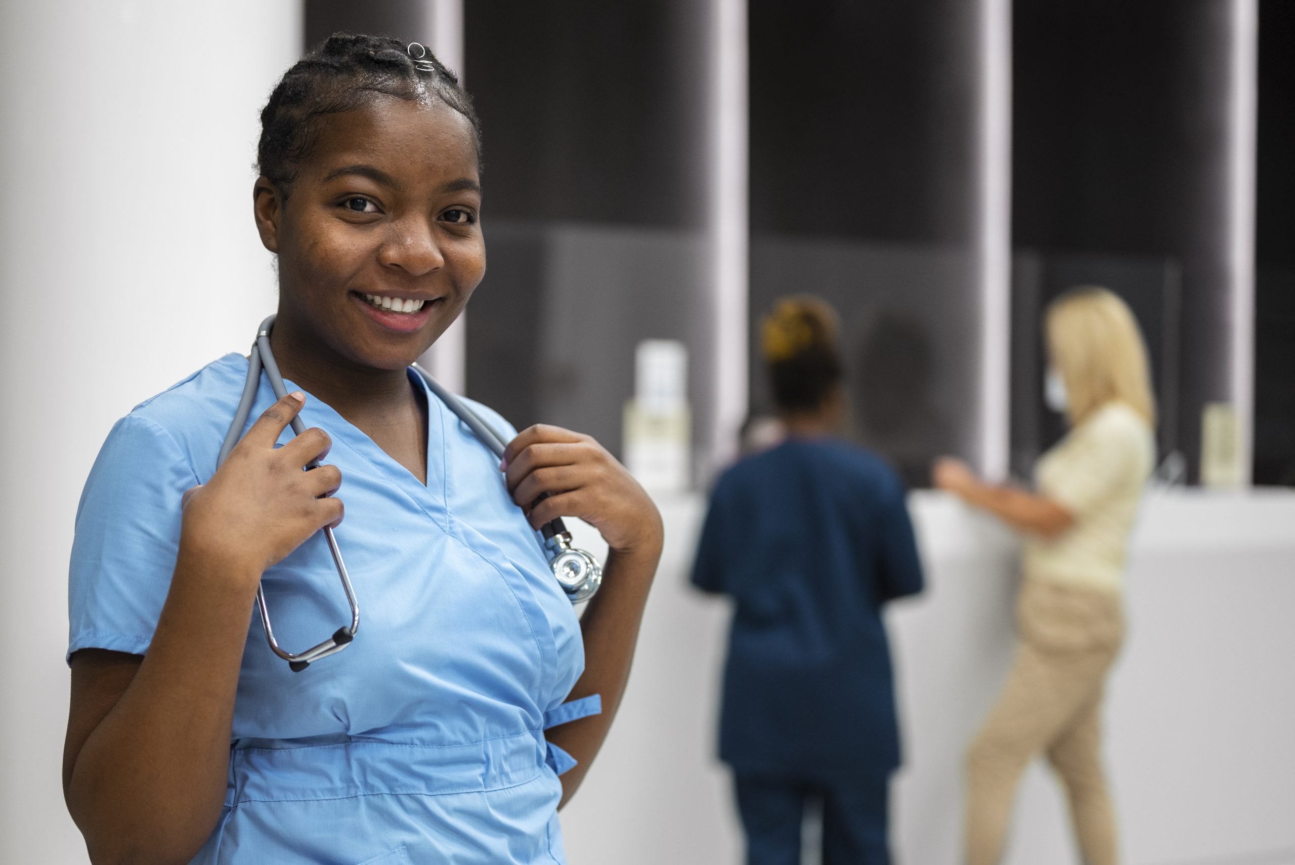 medium shot smiley nurse with stethoscope